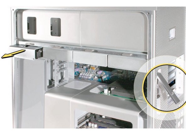 Image 1/1: Then, remove all 4 of the drive bays and set them aside.