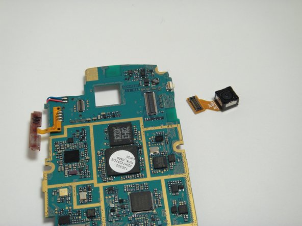 Image 2/2: Connect new camera into the motherboard and reverse the steps to put the phone back together.