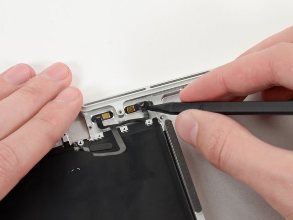 Image 1/2: At this point the second microphone should be completely detached from the upper case.