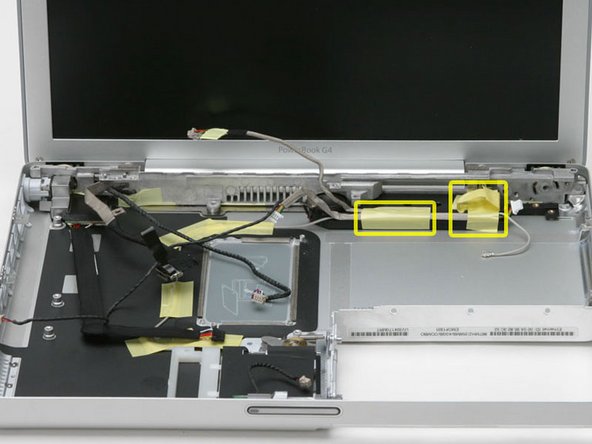 Image 1/1: Remove the single Phillips screw from the right side of the subwoofer, under the tape you just removed.
