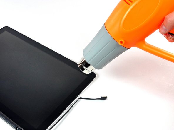 Image 1/2: Before starting, be sure to clean the display glass with lint-free cloth moistened with a mild solution; it will make the suction cup adhere better, and will make checking for dust on reassembly easier