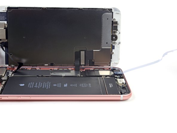 Take care not to touch the exposed adhesive.