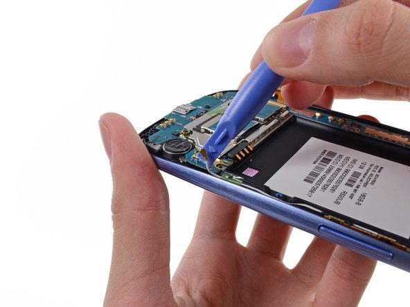 Image 3/3: Gently move the cable out of the way of the  motherboard.