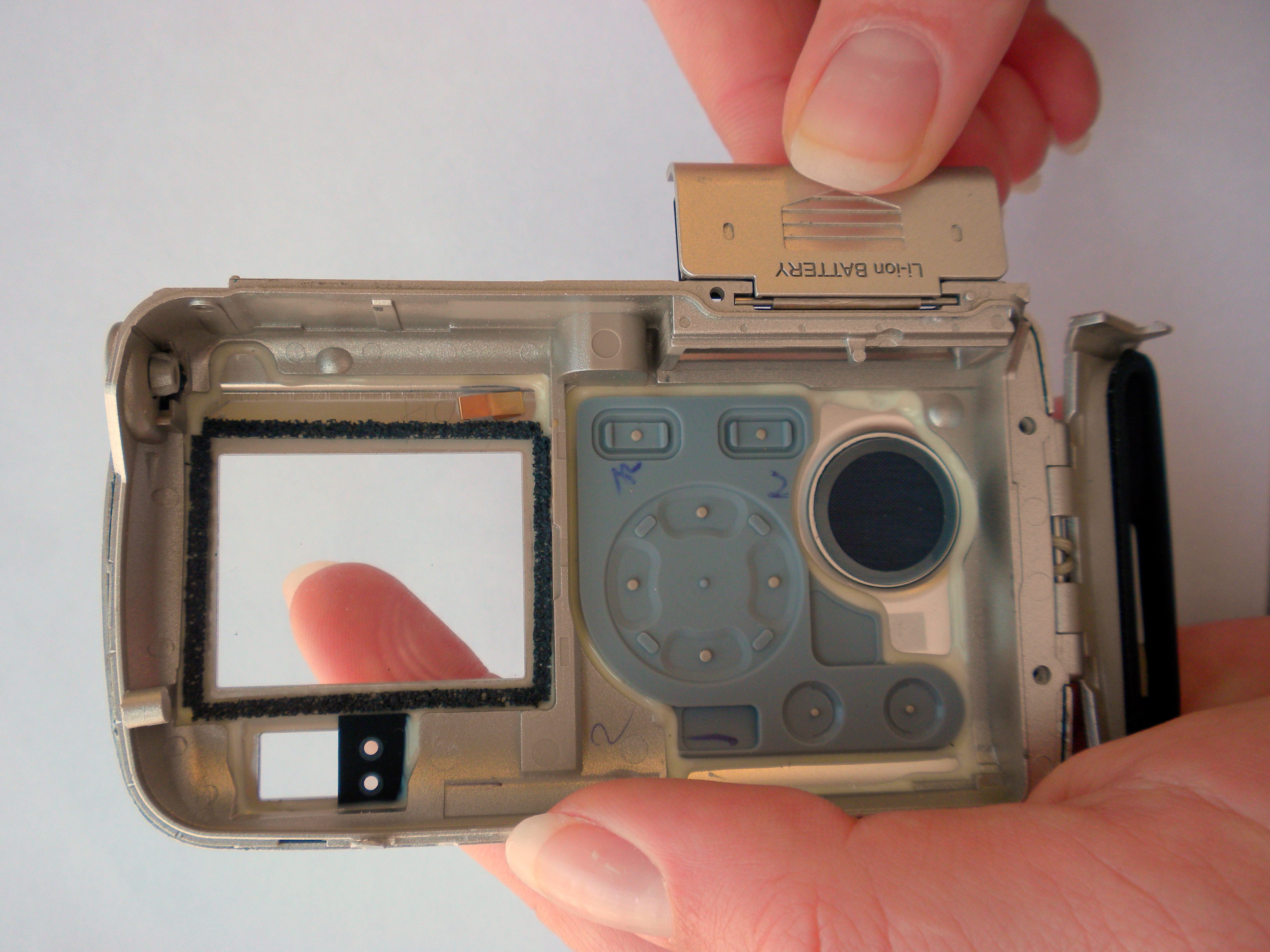 Olympus Stylus 410 Battery Cover Replacement iFixit Repair Guide