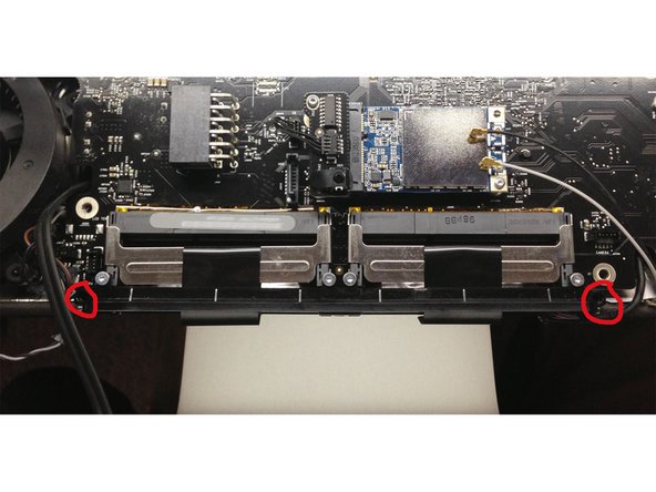 Image 2/2: Now simply lift out the logic board while keeping a careful eye on all those wires you just disconnected. The heatsink fins are attached to the logic board and lift out with it.