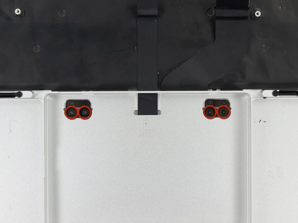 Image 1/1: Four 1.4 mm Phillips #000 screws