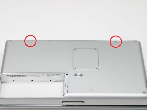 Image 1/1: Close the bottom case and turn the laptop over.