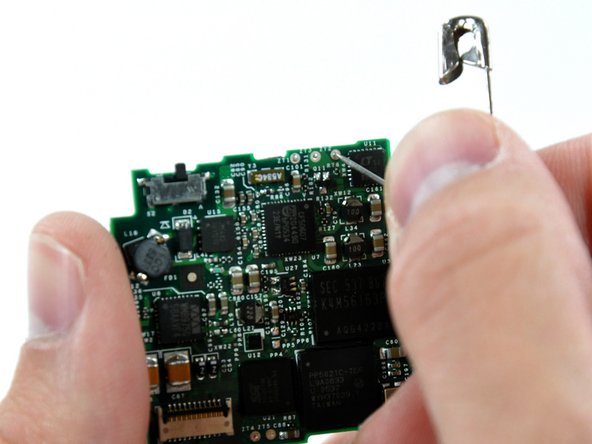 To aid in soldering the new battery, be sure the solder pad holes are clear of solder. This way, you can insert the new battery leads and solder them in place.