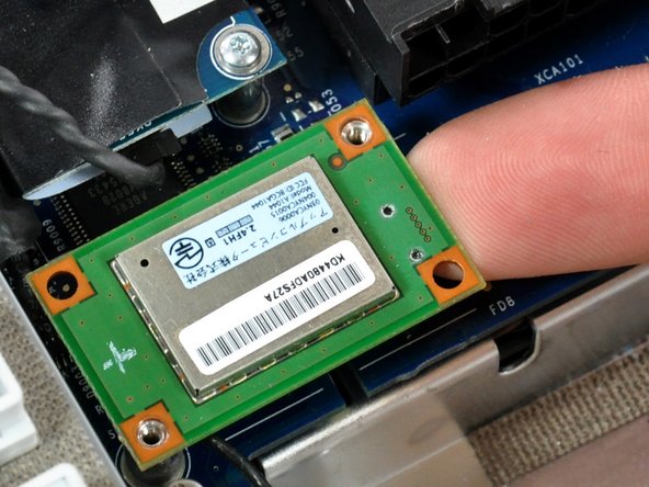 Image 1/2: Be sure to lift the Bluetooth board from its right edge only.  Trying to lift it up from any other side will shear the connector off the Bluetooth board.