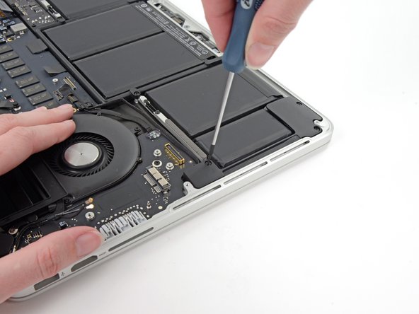 Image 2/3: Another swish and flick and the speakers are charmed out of the rear case.