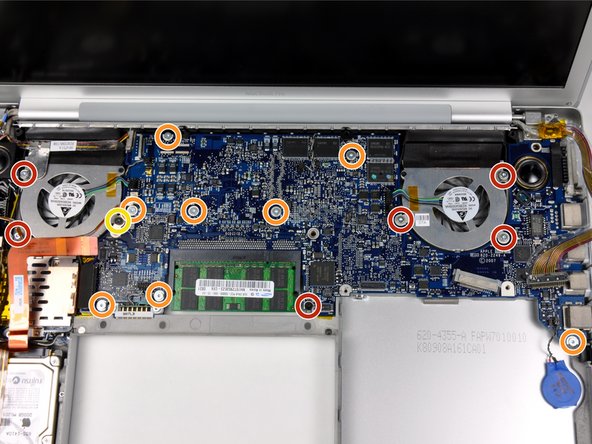 Image 1/1: One 4.4 mm black Phillips screw to the right of the ram slot.