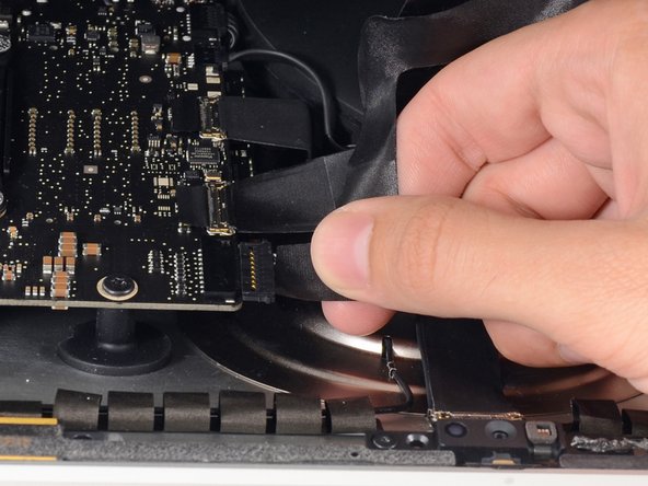 Image 2/2: Lift the display up enough to have easy access to the connector, but not so much that you stretch the cables and stress their connections (about 8").