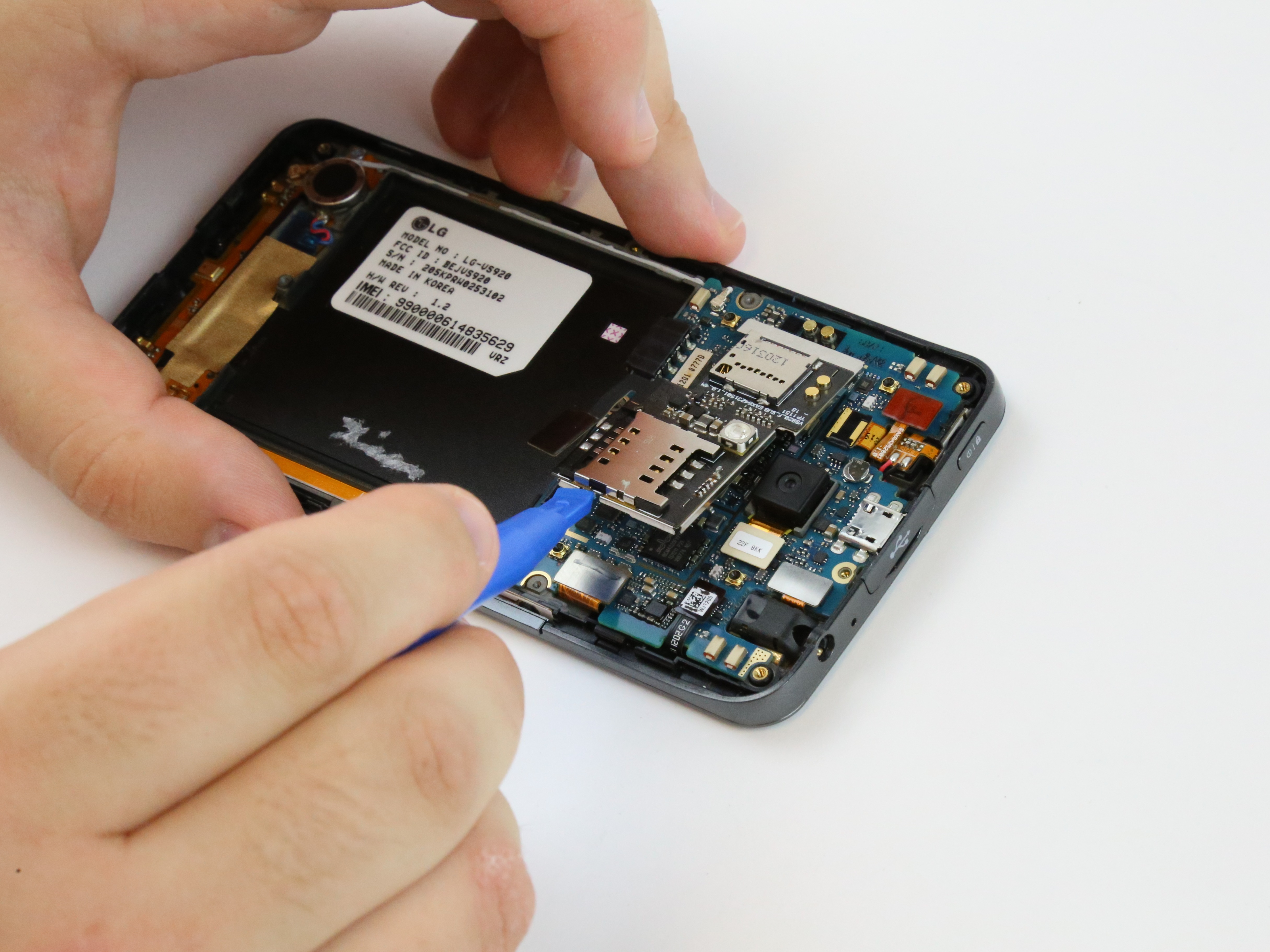 LG Spectrum Sim/SD Port Replacement iFixit Repair Guide