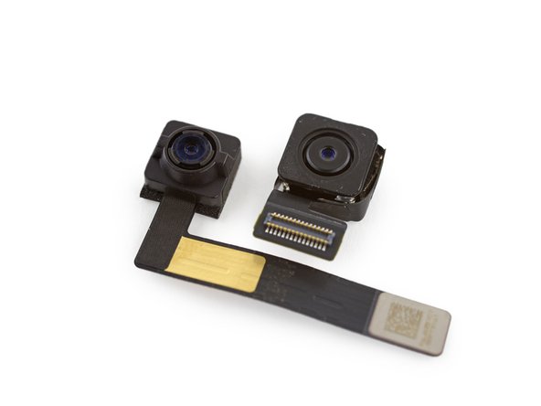 Image 3/3: For those of you keeping score: the rear-facing camera captures the same 8 MP images and 1080p video at 30 fps, while the front-facing selfie cam shoots identical 1.2 MP images and 720p video.