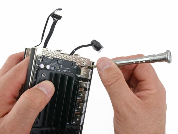 Image 1/2: With the screws out of the way, the layers slide right apart.