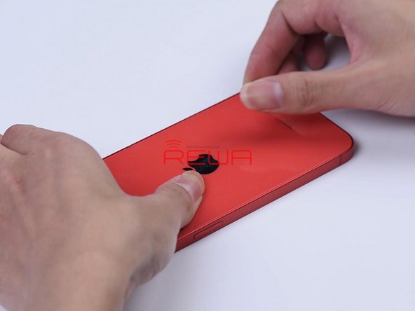 Apply some adhesive evenly on the middle frame. Put the back glass in position and press it gently against the middle frame.