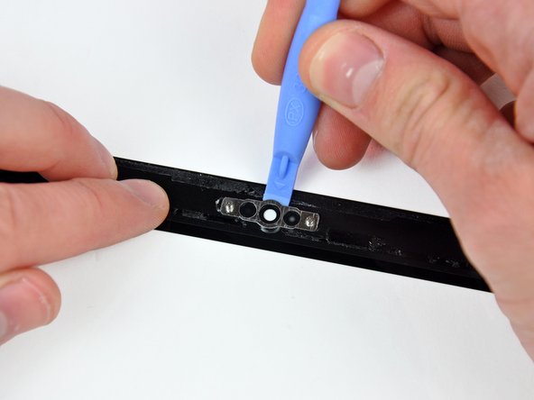 Image 1/2: Do not forget to stick the camera bracket down to the new front display glass before reassembly.