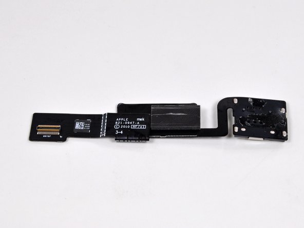 Image 2/3: It sure  doesn't look like Apple was tight on space. As far as we know, the only purpose of this board is to connect the SIM card to the logic board.