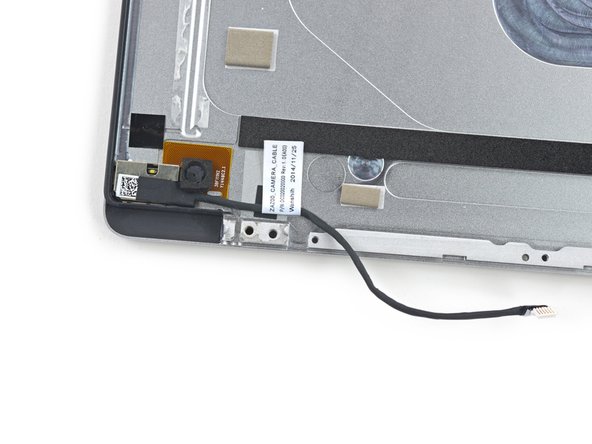 With the display fully out of the top case, we get a peek at the peeper of a selfie-cam.