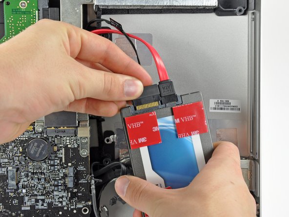 Image 2/2: The SATA connectors will be nearest the top of the iMac when the hard drive is installed.