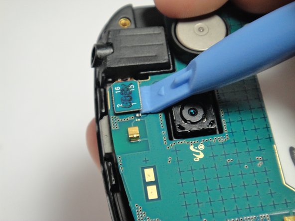 Image 3/3: Disconnect the screen connector from the back of the motherboard.