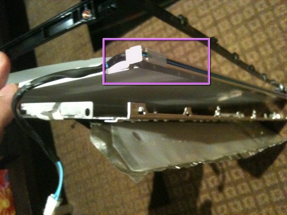 Image 2/3: The top CCFL tube can be seen and '''CAREFULLY''' removed
