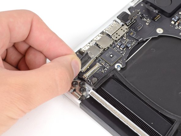 Image 2/2: Do not lift up on the display data cable, as its socket is very fragile. Pull the cable parallel to the face of the logic board.