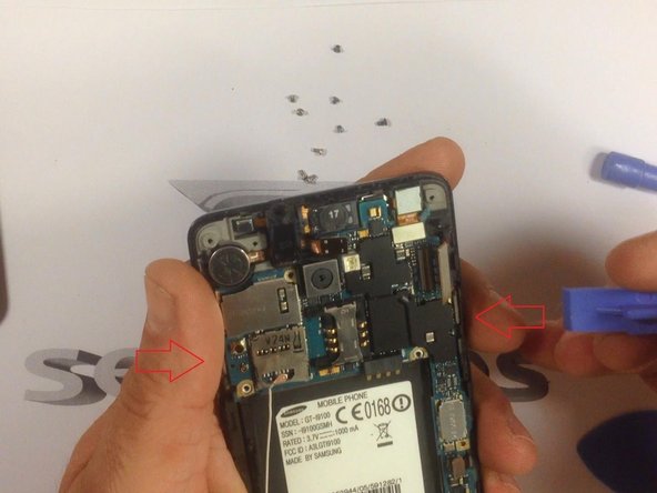 Release the side buttons. The arrow will point you to where they are.