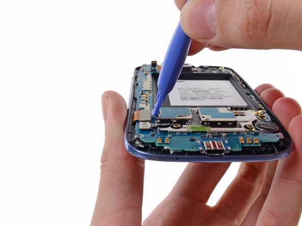 Image 1/2: Disconnect the display data cable from the motherboard.