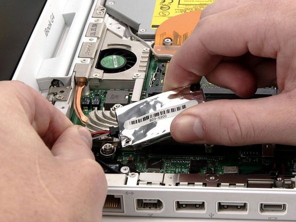 Disconnect the RJ-11 cable from the top of the modem.