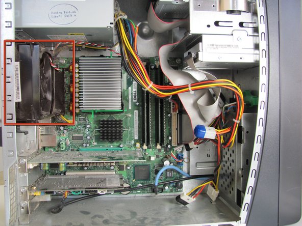 Image 1/1: Lay the computer flat on it's side so that you are looking down at all of the components.