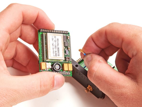 Image 3/3: The small blue wire connects the GPS antenna to the GPS receiver board.