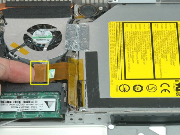 Disconnect the orange optical drive ribbon cable from the logic board.