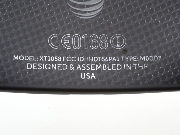 Image 3/3: Since we tend to have a lot of devices laying around, we might as well do some comparisons! The Moto X is certainly not small, but it is a bit smaller than the S4, and we are fans of the contoured back.