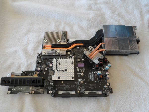 Image 2/3: Those heat pipes flow to fins above the main blower. This is what 4 years of dust accumulation looks like. Is this the reason my VRAM died?