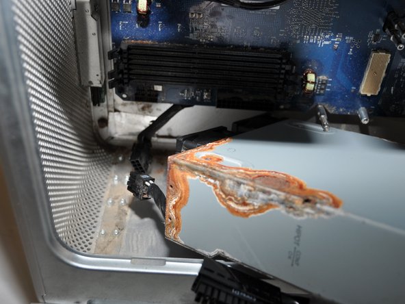 Image 2/2: Now the power supply should come out of the computer freely.