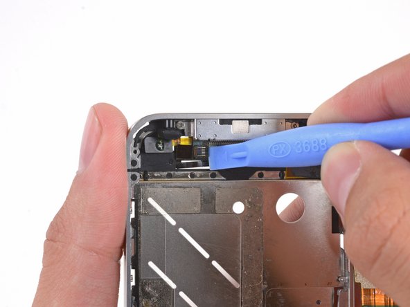 Image 1/3: Be sure you are prying up on the cable retainer, '''not''' the socket itself.