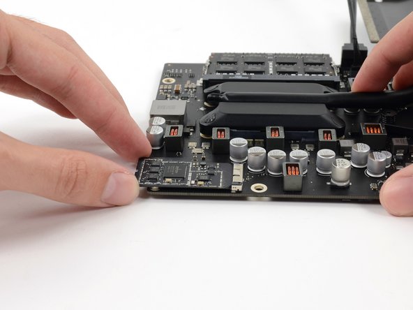 Image 1/3: '''Do not''' use excessive force to pull the end of the AirPort/Bluetooth Card away from its socket on the logic board. Doing so may damage the socket.
