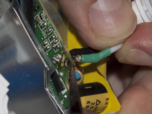 Image 2/3: Separate the cables. It may require some force, so be careful not to break the board.