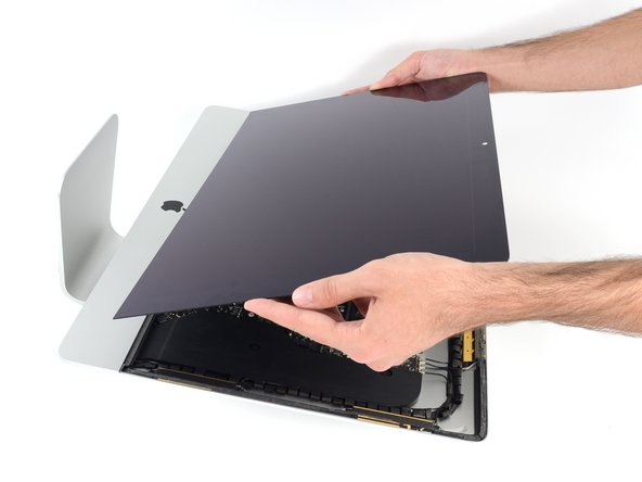 Image 3/3: Be very careful handling the display—it's big, heavy, and made of glass.