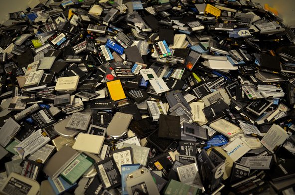 A pile of old cell phones at Recellular warehouse