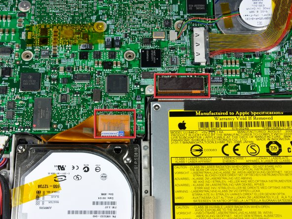 Image 1/2: Disconnect the right speaker cable connector.