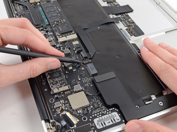 Image 1/3: Be sure you are prying up on the hinged retaining flap, '''not''' the socket itself.