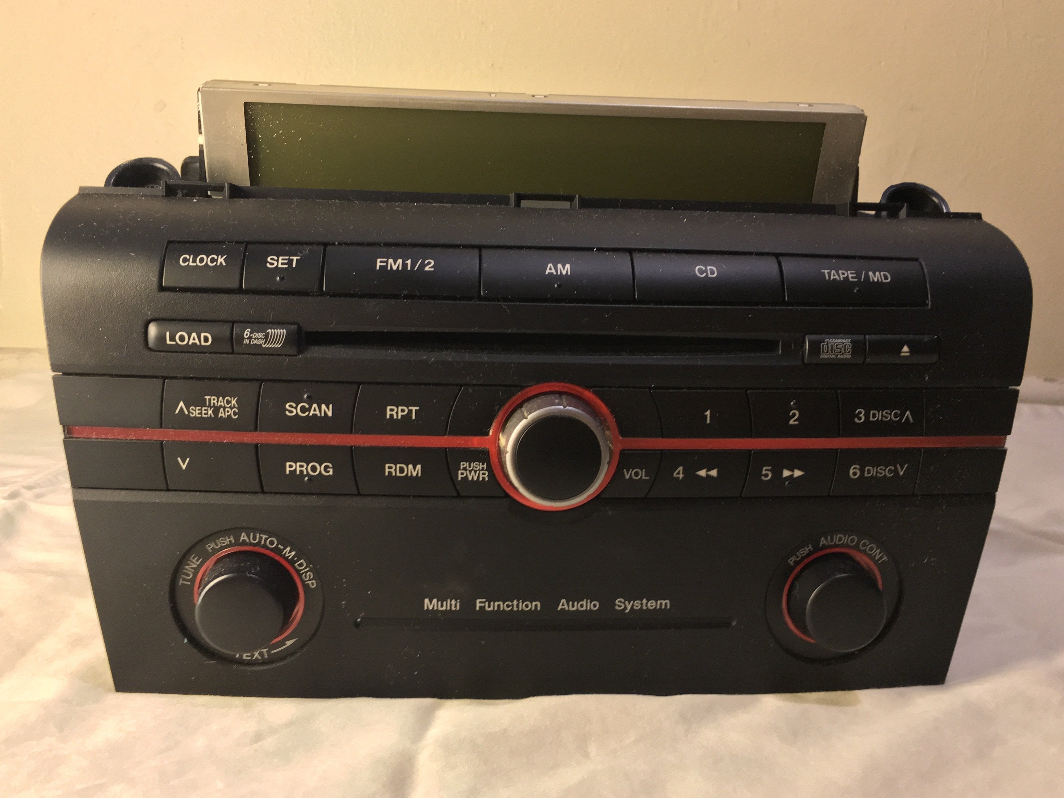 2004 Mazda 3 StereoCD Player (BN85669RXA) Disassembly iFixit