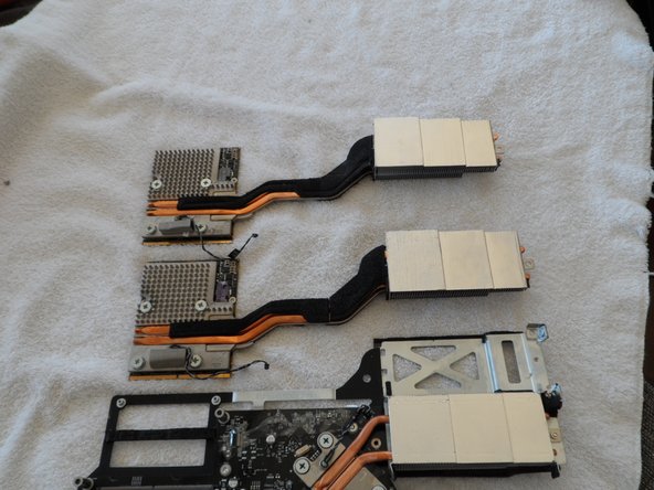 Image 2/3: ''You World of Warcraft players out there might agree my son and I thought the old video card makes a pretty authentic-looking Gnomish 1H axe. Glory to the Alliance!''  :-)