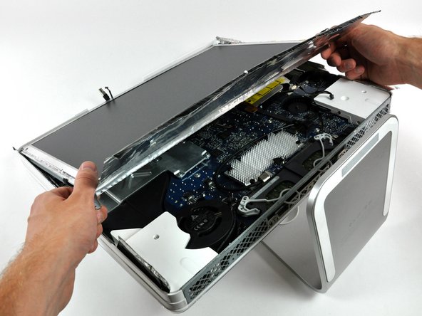 Image 1/1: Be mindful of any cables that may get caught during removal.