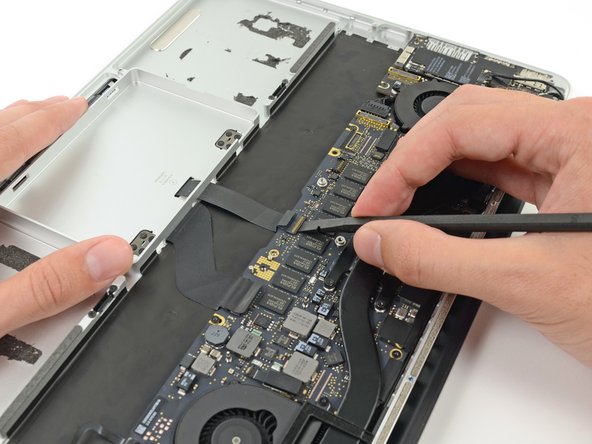 Image 1/2: Be sure you are prying up on the hinged retaining flap, '''not''' the socket itself.