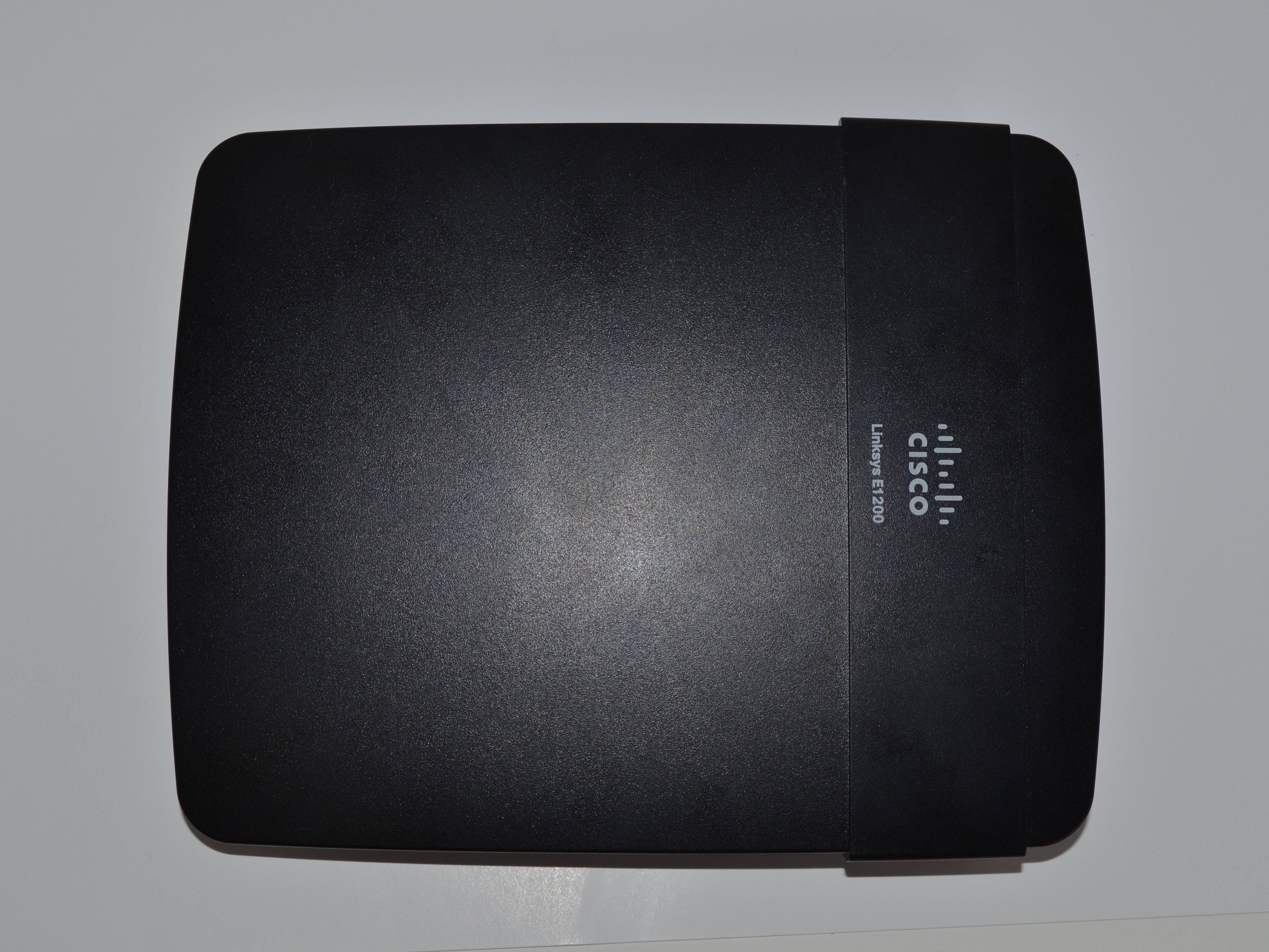 Disassembling the Linksys E1200 - iFixit Repair Guide