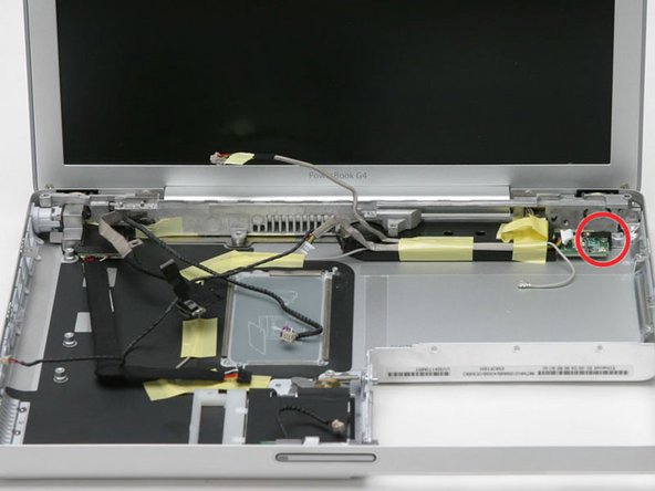 Image 1/1: Lift the bluetooth board out of the computer.