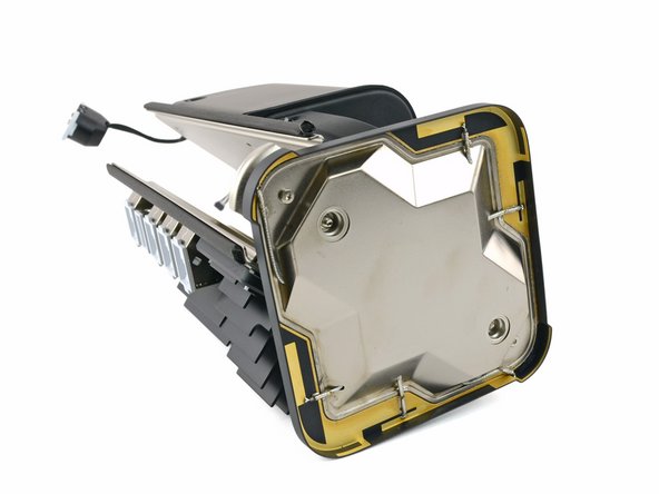 Image 1/2: The six antenna cables run under the apparent hard drive slot, up the center of the device, and into a big plate at the top, which functions as the antenna.